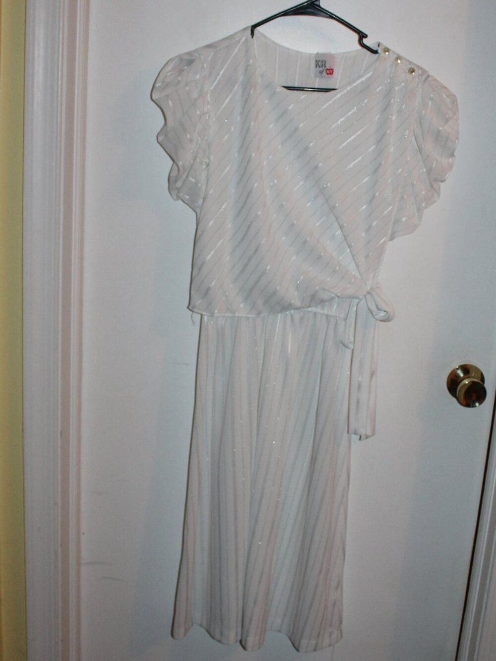 Vintage KR of NY white wrap dress featuring diagonal gold metallic pinstripes.